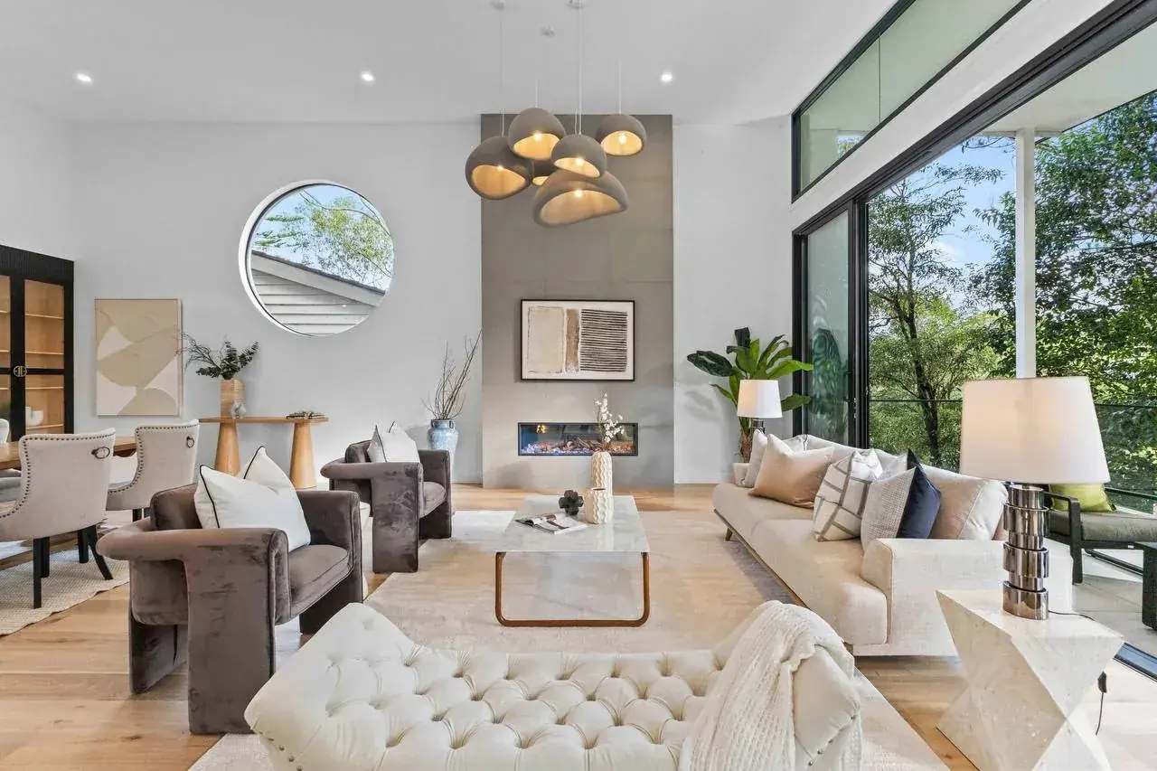 Living room with a large round window, Hornsby Heights